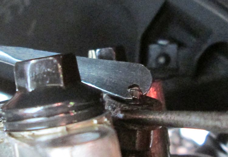using tools to adjust the tappets and double checking