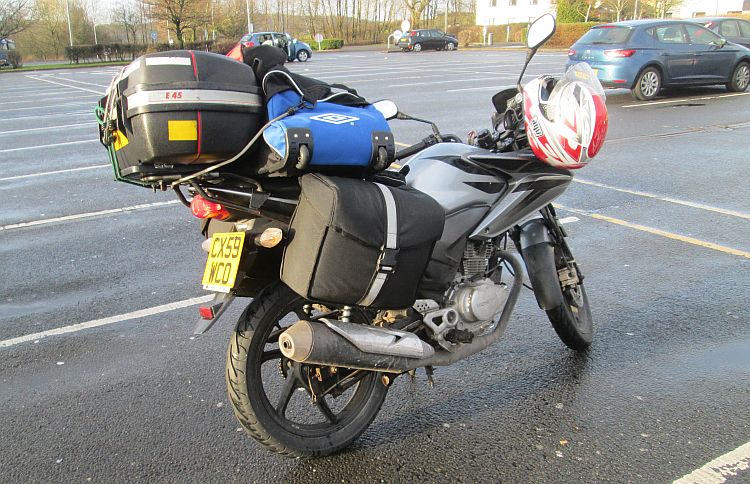 Ren's CBF 125 complete with saddle bags, large bag and top box, ready to camp