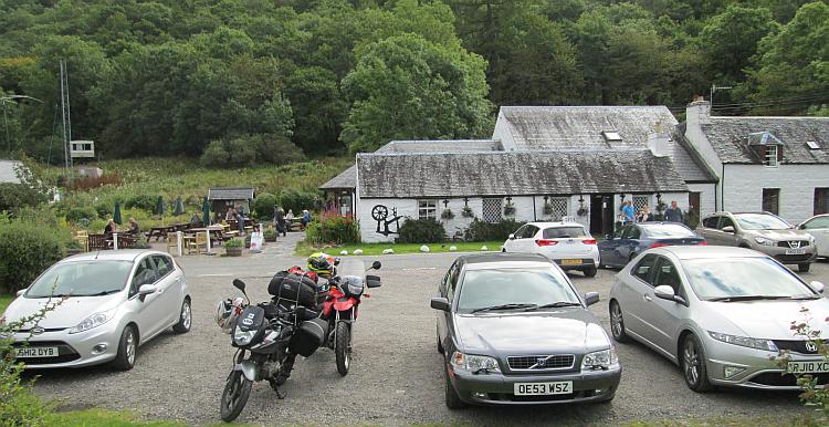 Crafts and things cafe. A white building with our motorcycles outside near Glencoe