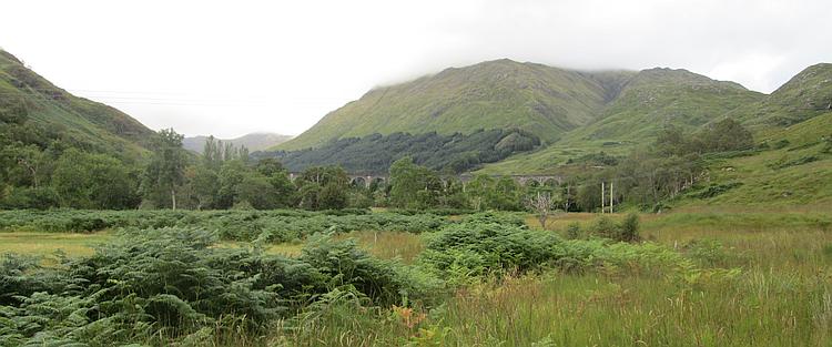 At Glenfinnan you can just make out the arches of the rail bridge seen in Harry Potter films