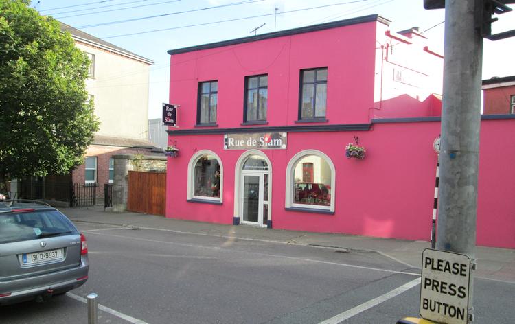 A bright pink building in Skibbereen with 