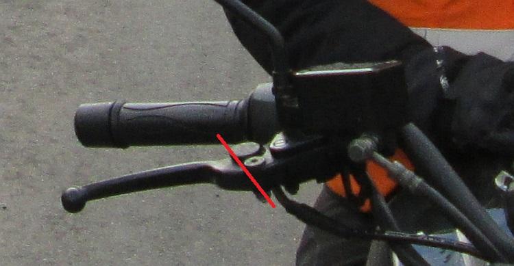 The Keeway brake lever with a red line showing where the lever has broken