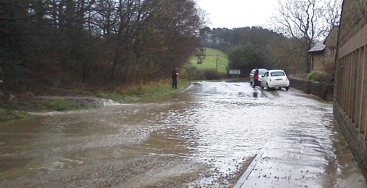 The flood and the large amounts of gravel outside of Rivington's lower barn