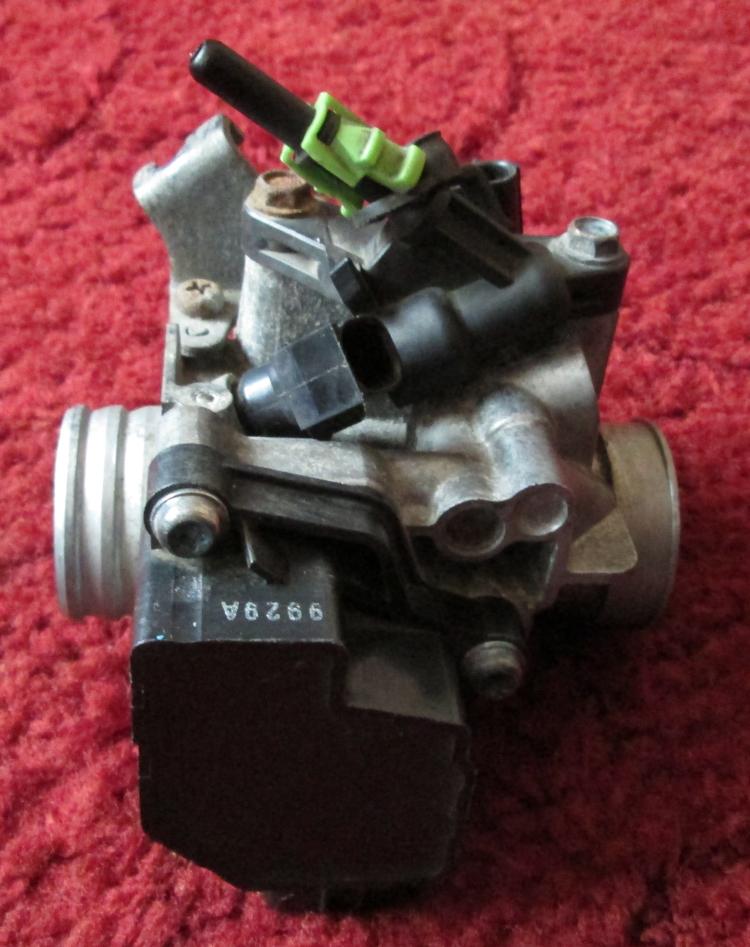 A throttle body from the injection system CBF 125