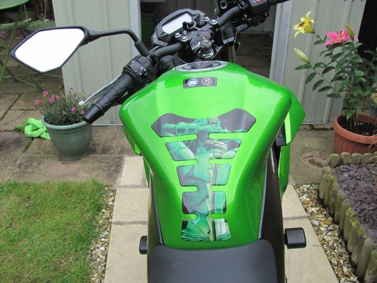 The tank pad on Sharon's bike has an image of a female samuri