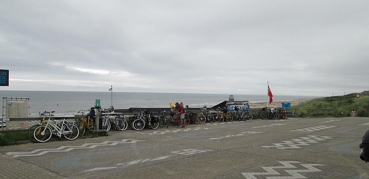 Bicycles leant against a fence at the beach in Domburg