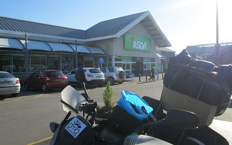 The CB500X parked outside Asda Bideford in blue skies