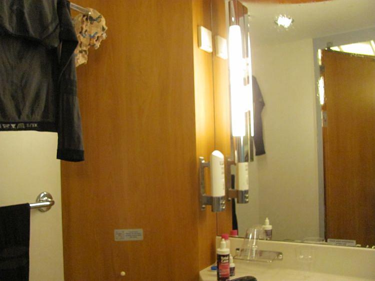 The inside of the cabin bathroom with a mirror and sink